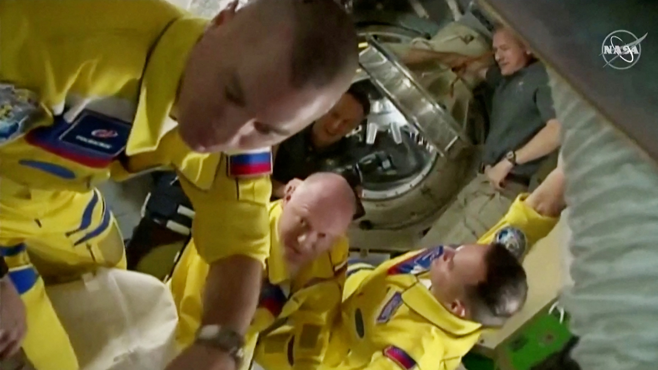 Russia denies cosmonauts wore yellow jumpsuits in sigh of Ukraine invasion