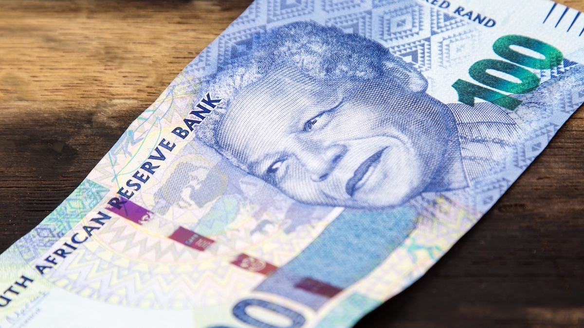 Rand firmed on softer dollar, 50bps fee hike