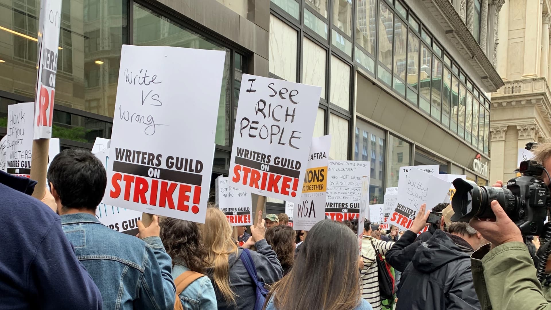 ‘I got a take a look at the opposite day for $8’: TV and film writers portion why they’re on strike