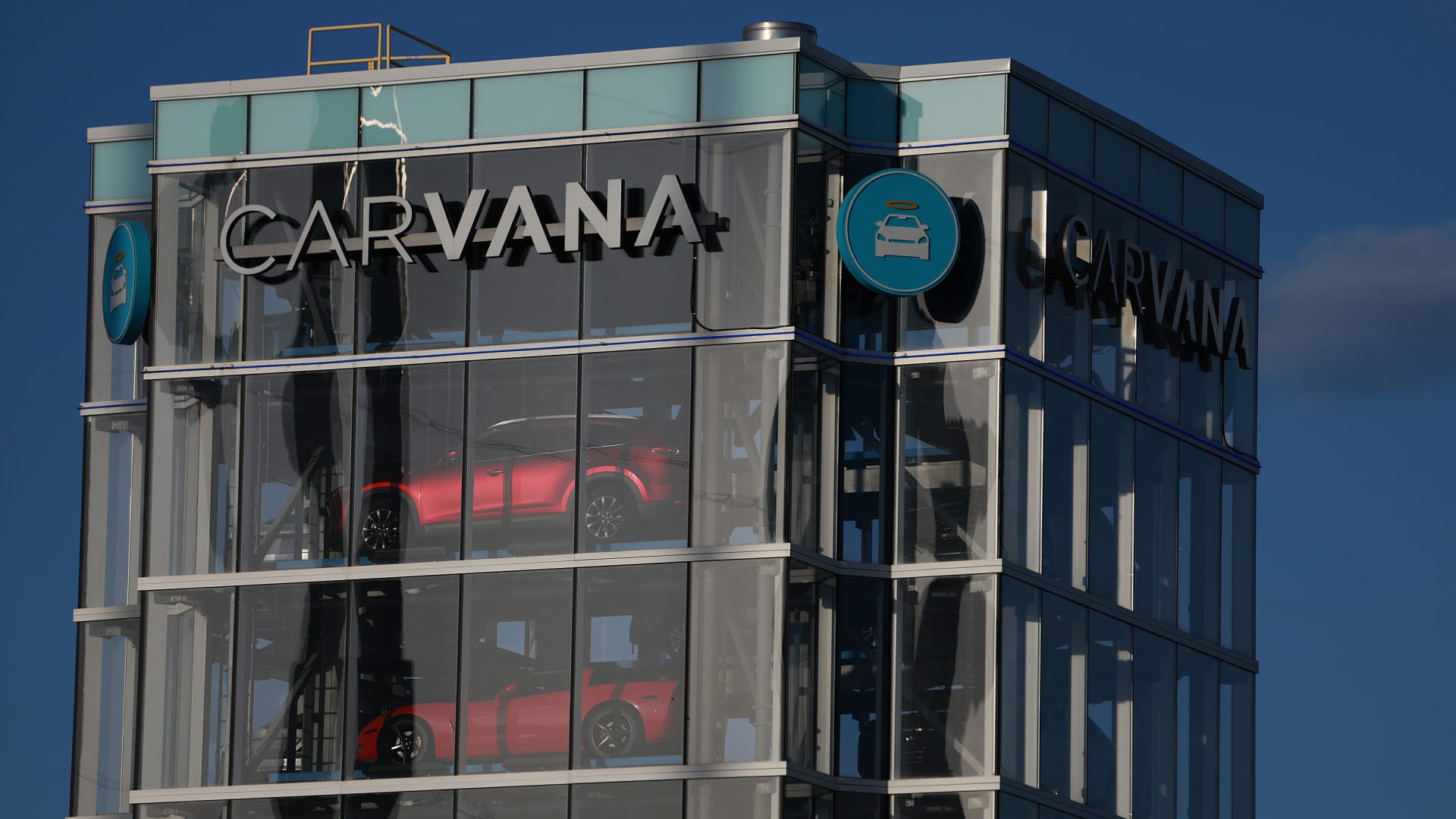 Stocks making the largest moves noon: Carvana, Goldman Sachs, AT&T and extra