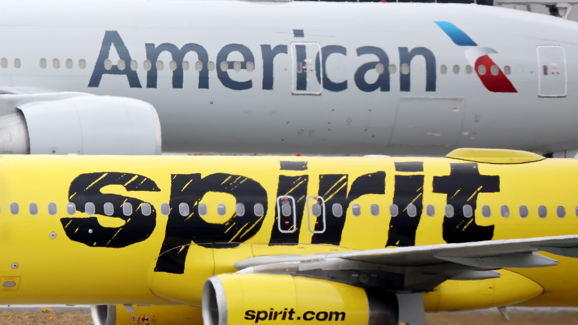 American Airways, Spirit Airways gash summer season profit forecast on greater costs