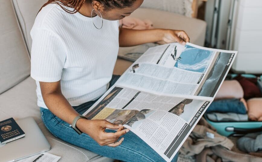 a woman reading a magazine